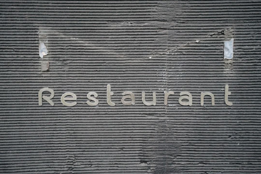 the-word-restaurant-written-on-the-side-of-a-building-xyy-ywano-c